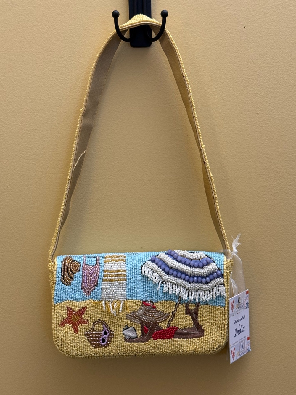 Made in India Handcrafted beaded girl sunbathing on beach. NWT Tik Tok Famous